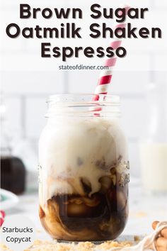 brown sugar oatmilk shaker espresso in a mason jar with a red and white striped straw