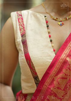 Rich fabric, a trendy back, and a stylish cut, it has all the right elements that make a perfect blouse. The attention to detail further enhances it and gives the blouse a great finish. From planning a distinct look for a new saree to upcycling an old saree, this blouse is your perfect companion as it can be paired with many drapes and effortlessly amp up all your looks. Need minor customizations? Ask us and we will try our best to make it happen! SIZE GUIDE : To determine your blouse size, please measure around the fullest part of your bust line using a measuring tape. Your bust measurement will correspond to the size you need to order. For example, if you measure 36 inches, please order size 36. If your measurement falls between sizes, you may order the next size up (for example, if you Potli Button, Raw Silk Blouse, Blouse Designs Catalogue, Sari Design, New Saree, New Saree Blouse Designs, Latest Model Blouse Designs, Fashionable Saree Blouse Designs, Sari Blouse Designs