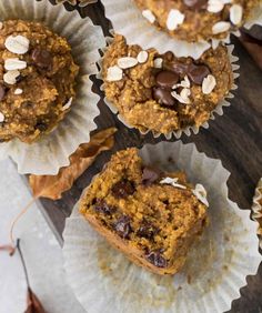 several muffins with chocolate chips and almonds on top