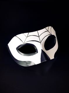 This sugar skull masquerade mask captures the essence of Dia de los Muertos, allowing you to honor tradition and celebrate life. The simple black-and-white color scheme adds an element of contrast and sophistication to your look, allowing it to match any outfit! Age Group/Gender - Adult/Men Size/Type - One size fits all adults Mask Color - White/Black Mask Material - Polyresin Accent Material - Paint Skull Masquerade Mask, Elegant Mask, Mardi Gras Kid, Kids Party Packs, Female Mask, Skull Mask, Celebrate Life, Masquerade Mask, Black Mask