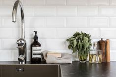 the kitchen counter is clean and ready to be used as a soap dispenser