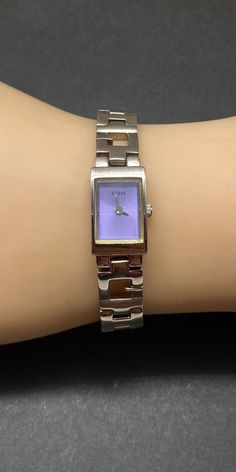 Beautiful Guess Watch Purple Stainless Steel Ladies fits tiny wrist Watch 6 1/4" length by 1/2" width Pre/owned working condition new battery installed. Guess Watches Women, Guess Women Watches, Guess Watch, Women Wrist Watch, Womens Watches, Jewellery And Watches, Wrist Watch, Jewelry Watches, Violet