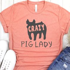 a women's t - shirt with the words crazy pig lady printed on it