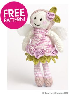 a knitted doll with pink and white stripes