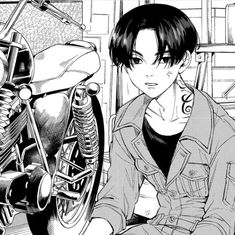 a black and white drawing of a person sitting next to a motorcycle