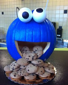 an image of cookie monster with cookies in it's mouth and the caption reads,