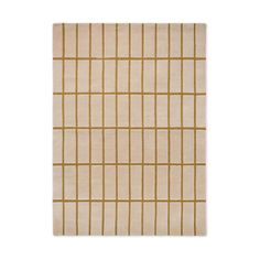 a beige and gold rug with squares on it, in the shape of a grid