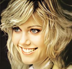 a close up of a person with blonde hair and blue eyes smiling at the camera