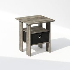 an end table with two drawers on one side and a black drawer on the other