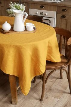 TURMERIC LINEN TABLECLOTH-Enhance your home with the natural beauty and timeless style of linen. Tablecloth Decorations, Tablecloth Ideas, Table Cloth Decorations, Elegant Tablecloth, Dining Space, Linen Tablecloth, Dining Experience, Dining Experiences, Tablecloths