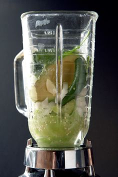 a blender filled with lots of different types of fruit and vegtables