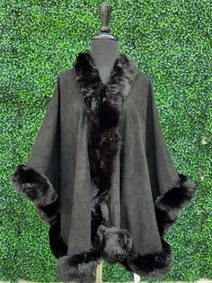 Now, this is très chic! This fur will elevate any Winter outfit. Throw this on top of any holiday dress to add warmth and drama!! The open cape style allows for it to be worn thrown over one shoulder or normally with the hook and eye. Style: Suede cloth faux fur-edged cape Neckline: Faux fur collar Closure: Single hook and eye Shell: 100% Polyester Wash instructions: Hand wash cold, tumble dry low Cape Style, Throw Over, The Hook, Holiday Dress, Tres Chic, Gift Boutique, Faux Fur Collar, Grey Khakis, Shopping Spree