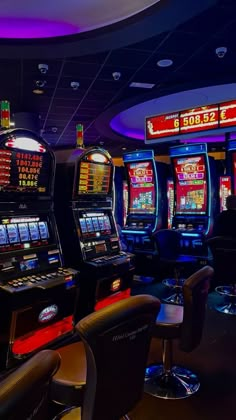 a casino room filled with lots of slot machines