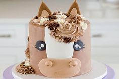 a decorated cake with a horse's head on top