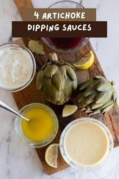 artichoke dipping sauces on a wooden cutting board