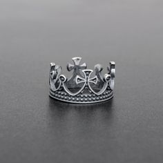 "✈️ Free DHL Express shipping to USA, EU countries & Canada - delivery in just 2 days! 925 sterling silver ring for women shaped into a 👑crown with four cross tips. Please choose your size from the drop down list ✅A unique design made with great craftsmanship and detail for the bold modern woman. Its construction is 💪 robust and reliable while undergoing a special oxidation treatment process, which gives a 👌stunning matte velvety texture and at the same time makes it immune to the factors Medieval Ring, Silver Ring For Men, Silver Crown Ring, Mens Earrings Studs, Medieval Rings, Queen Rings, King Ring, Mens Earrings Hoop, Jewelry Men