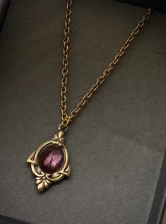 Aria Antique Gold Amethyst Necklace February Birthstone - Etsy Luxury Purple Heirloom Necklace, Antique Brass Gemstone Jewelry, Antique Gold Spiritual Necklace With Vintage Charm, Spiritual Gold Necklace With Vintage Charm, Collectible Brass Gemstone Jewelry, Vintage Gold Pendant Crystal Necklace, Antique Gold Necklaces With Vintage Charm And Oval Pendant, Vintage Gold Crystal Pendant Necklace, Antique Gold Necklace With Vintage Charm Oval Pendant