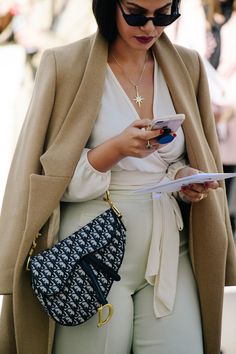 Street Style At Paris Fashion Week Will Provide You With Plenty of Fall Outfit Inspiration Photos | W Magazine Dior Saddle Bag Street Style, Dior Bag Outfit, Paris Fashion Week Street Style, Inspiration Photos, Outfit Inspiration Fall