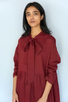 A stripe dress | 50% handloom cotton 50% handloom silk    - comfort fit  - inseam pockets  - made in india  - model is 5’ 8” and wearing a small/medium size    garment measurements  small/medium: length: 46" chest: 56" shoulder: 21.5"  large: length: 46.5" chest: 58" shoulder: 22.5"    *please note these are the approximate measurements in inches. all the products are handcrafted and the measurements may vary a little due to its handcrafted nature. Boy Smells Candles, Denim Hat, Stripe Dress, Mid Dresses, Jodhpur, Red Stripe, 50's Dress, Designer Outfits Woman, Swimwear Tops