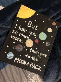 a book that is laying on top of a bed with the words, i love you so much more than just to the moon and back