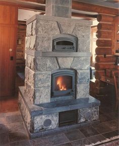 a large stone fireplace in a living room