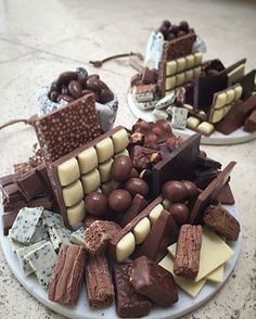 two plates filled with different types of chocolates