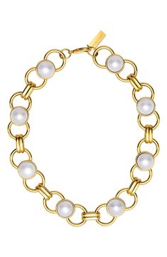 Freshwater-pearl stations provide an elegant contrast to the mixed chain links of this striking necklace plated in 18-karat gold. 17" length; 2" extender Lobster clasp closure Pearl size: 14.5–15mm 18k-gold plate/freshwater pearl Imported Chain Links, Station Necklace, Pearl Size, Chain Link, Lobster Clasp, Fresh Water, Freshwater Pearls, 18k Gold, Gold Plate