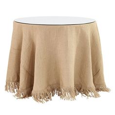 a round table with fringes on it