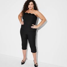 Black capri jumpsuit from Wild Fable™ with a strapless silhouette and rosette detailing. Made of a lightweight fabric blend with spandex. Tailored in a tapered-leg silhouette. Side zipper completes the design with a smooth look and a secure fit. If you're not satisfied with any Target Owned Brand item, return it within one year with a receipt for an exchange or a refund. Wild Fable™: A look for every story. Capri Jumpsuit, Tube Romper, Sweater Maxi Dress, Long Sleeve Maxi, Long Sleeve Mini, Knitting Women, Wild Fable, Wide Leg Jumpsuit, Lightweight Fabric