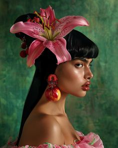 a woman with long black hair wearing pink flowers in her hair and earrings on her head