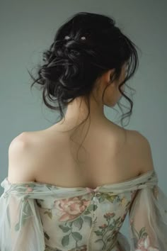 An elegant updo hairstyle on a person wearing a floral dress with sheer sleeves, viewed from behind. Hairstyles For Prom Updo Elegant, Prom Hairstyles Thick Long Hair, Prom Hairstyles Hair Up, Thick Hair Prom Hairstyles, Updo With Long Hair, Prom Hairstyles For Long Hair Bun, Hair Up Prom Hairstyles, Updos For Prom Medium Hair, Hairstyle Prom Night