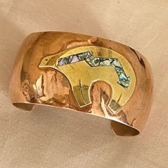 A Vintage Native American Copper And Brass Cuff Bracelet With Abalone Shell Inlay This Mid-Century Hand-Crafted Copper And Brass Cuff Is Detailed With A Brass Bear That Is Inlaid With Beautiful Abalone Shell. Length End To End: 5 3/4 Inches Gap: 1 5/8 Inches Weighs: 30 Grams Pre-Owned The Piece Has No Marks. It’s A Solid Cuff And A Nice Collectible Piece. In Good Condition With Lovely Patina. Wear Is Consistant With Age. *Collectible *Investment Brass Cuff Bracelet, Brass Cuff, Native Jewelry, Copper And Brass, Abalone Shell, Womens Jewelry Bracelets, Cuff Bracelet, Nativity, Native American