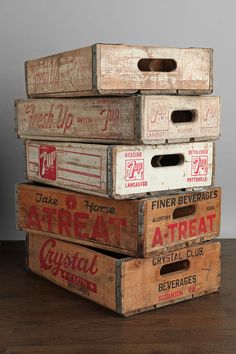 several wooden boxes stacked on top of each other