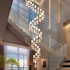 an elegant staircase with chandelier and glass balls hanging from the ceiling above it