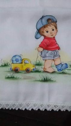 a little boy with a blue hat and red shirt