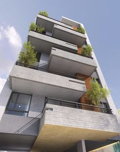 an apartment building with plants growing on the balconies