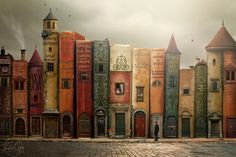 there are many books stacked on top of each other in front of a brick building