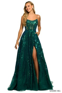 This gorgeous A-Line style dress is sure to make a show-stopping entrance! It features a luxe tulle fabric with a hint of glitter for a sparkling finish. It has a scoop neckline and straps for a comfortable fit. The corset lace up back adds a touch of glamour. The long length and thigh-high slit make this dress a perfect choice for prom or evening events! Turn heads in this dazzling statement dress. Lace Up Back Dress, Plastic Dress, Prom Dress Styles, Corset Lace, Embroidered Tulle, A Line Prom Dresses, Grad Dresses, Black Tie Event, Tulle Prom Dress