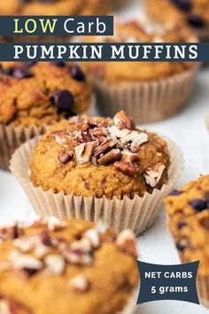 low carb pumpkin muffins with blueberries and pecans in the background