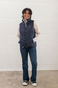 A warm gilet made with sustainable fill, to complement our Laurel coat. The popular Laurel gilet returns this season, made with the same Repreve® technology as our best-selling Laurel coat. Stay warm and cosy on autumnal walks, seaside ambles or when stopping for refreshment mid-wander. A useful ally on school runs, when the chill cuts through the sunshine, this gilet couples fashion with sustainability and practicality. Made with a water repellent outer, the Laurel gilet is enhanced with an ant Navy Gilet Outfit Women, Ladies Gilet, Fitted Navy Single-breasted Outerwear, Navy Fleece-lined Outerwear For Cold Weather, School Coat, Couples Fashion, Kids Clothes Sale, Full Length Coat, Mens Raincoat