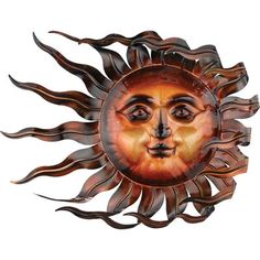 a metal sun face is shown with flames coming out of it's center piece