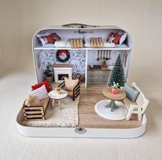 a doll house with furniture and accessories in it