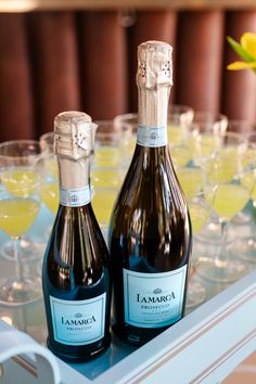 Detail photo of two bottles of prosecco and filled glasses at a brand activation event in Dallas, Texas. Activation Event, Lamarca Prosecco, Detail Shots