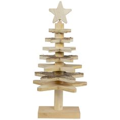 a wooden christmas tree made out of wood planks with a star on the top