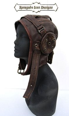 "Made to Order ** (5-7 business day)  If ordering internationally Please be aware of additional customs taxes and fees within your location>> ... -------The Aviator Cap that is the perfect accessory when it's time to adventure to other lands..----- .         This hand-distressed leather cap is imbued with character..Each piece is uniquely distressed ....no two leather surfaces are marked the same.. Each cap and is lined with a twill fabric..tucked in the lining in the back is a secret pocket to keep your treasures large enough for id and credit cards. The cap can also buckle in the front and has adjustability in the back. This is a form-fitting cap..but not tight... fits up to a 23\" head.. If you need it larger please specify the desired size when placing the order ** can also be customiz Fitted Hats Custom, Vintage Fitted Hat For Cosplay, Fitted Vintage Hat For Cosplay, Aviator Character Design, Poses From The Back, Dieselpunk Fashion, Steampunk Outfits, Aviator Cap