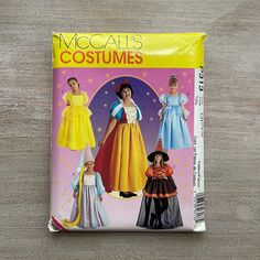 the front cover of a sewing pattern for children's costumes