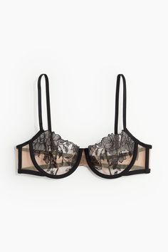 Balconette bra in sheer mesh with delicate embroidery. Adjustable shoulder straps  unlined underwire cups for natural shape and light support  and boning in sides. Hook-and-eye fasteners at back.