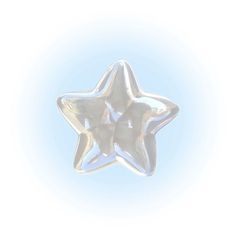 a clear star shaped object on a white background