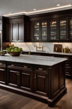 a large kitchen with dark wood cabinets and marble counter tops, along with an island in the middle