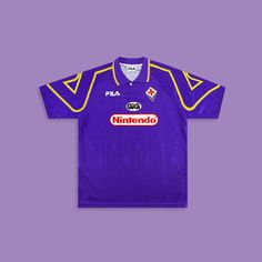 a purple shirt with yellow trims on the chest, and an image of a soccer player's jersey